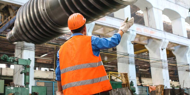 Pipeline engineer giving instructions on setting up a pipeline system