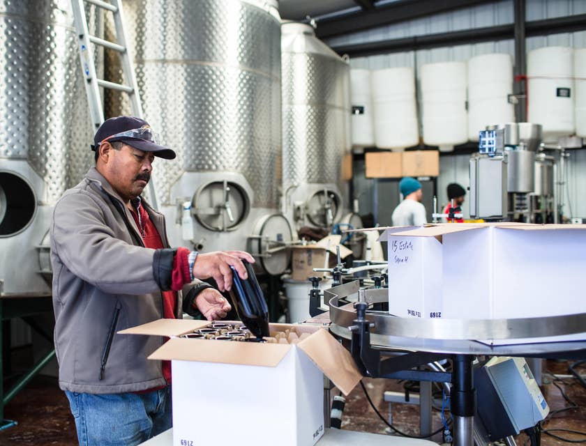 Production associate checking the quality of the final product before packing.