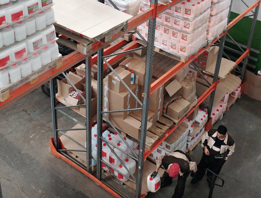 Production supervisor checking every item quality before forwarding it to shipping department.