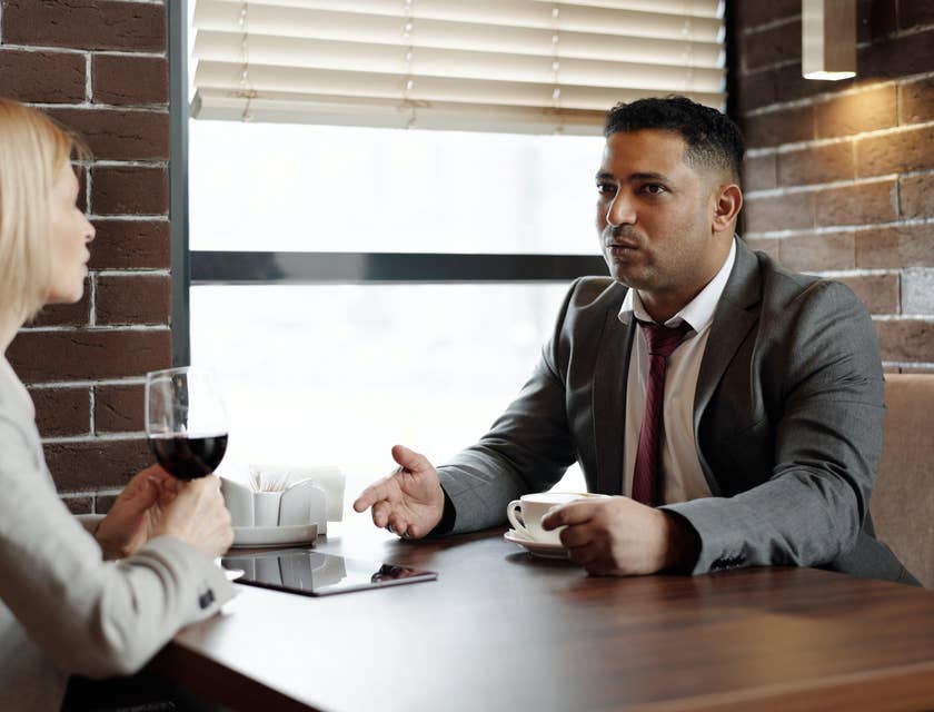 Property consultant asking the client various questions to help her find a good property