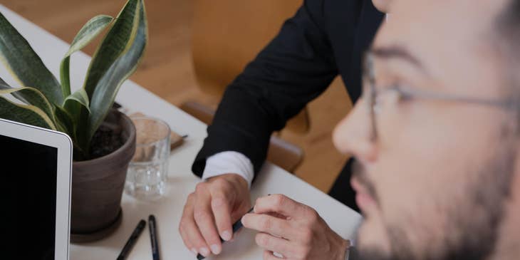 Purchasing specialist in a meeting with a supplier negotiating about the purchase terms and conditions