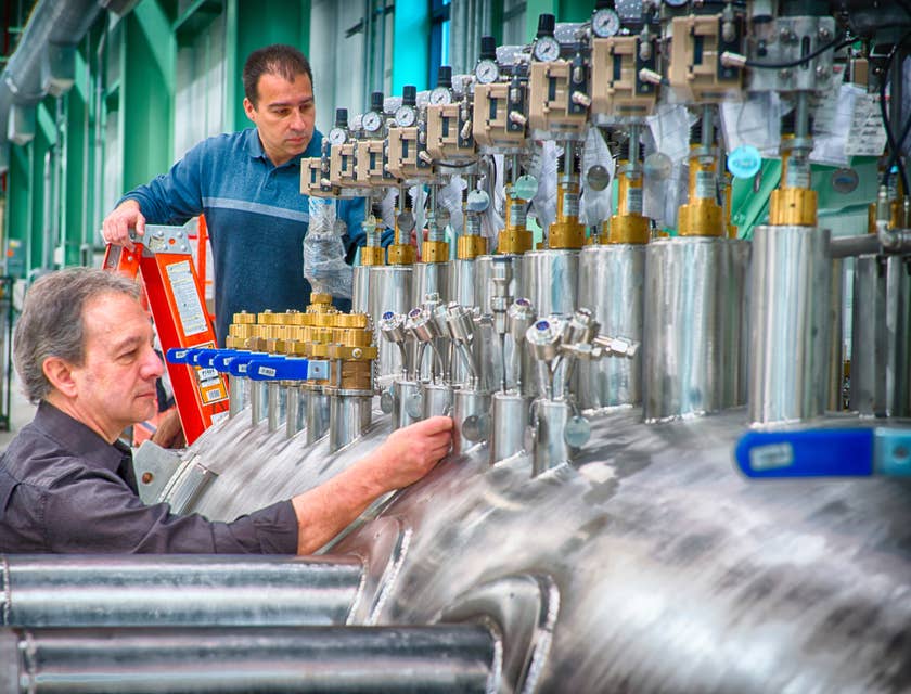 QA technician doing manual quality check on the equipment