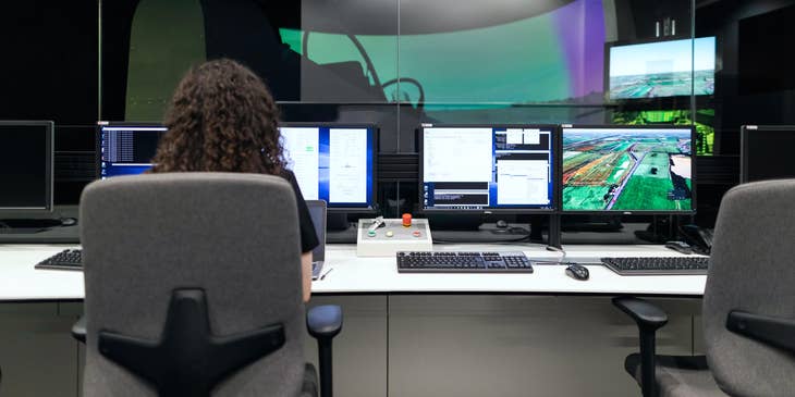 female QA tester doing tests to improve the company's software program usability