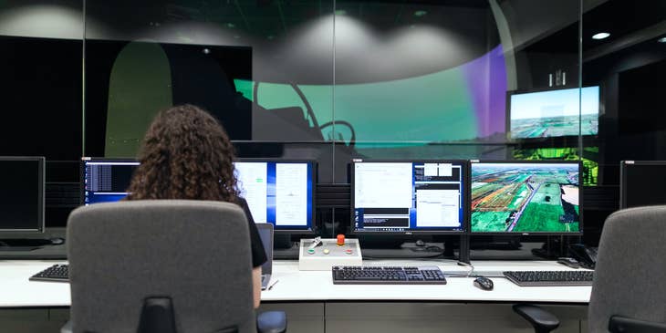 female QA Tester doing tests to improve the company's software program usability