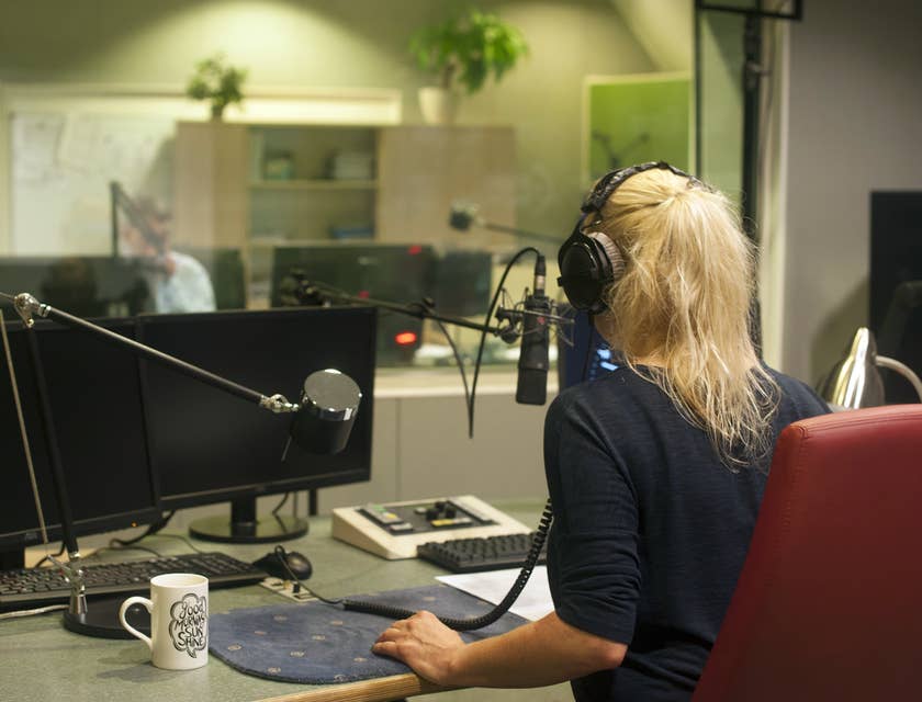 Radio DJ ensures recorded music is playing