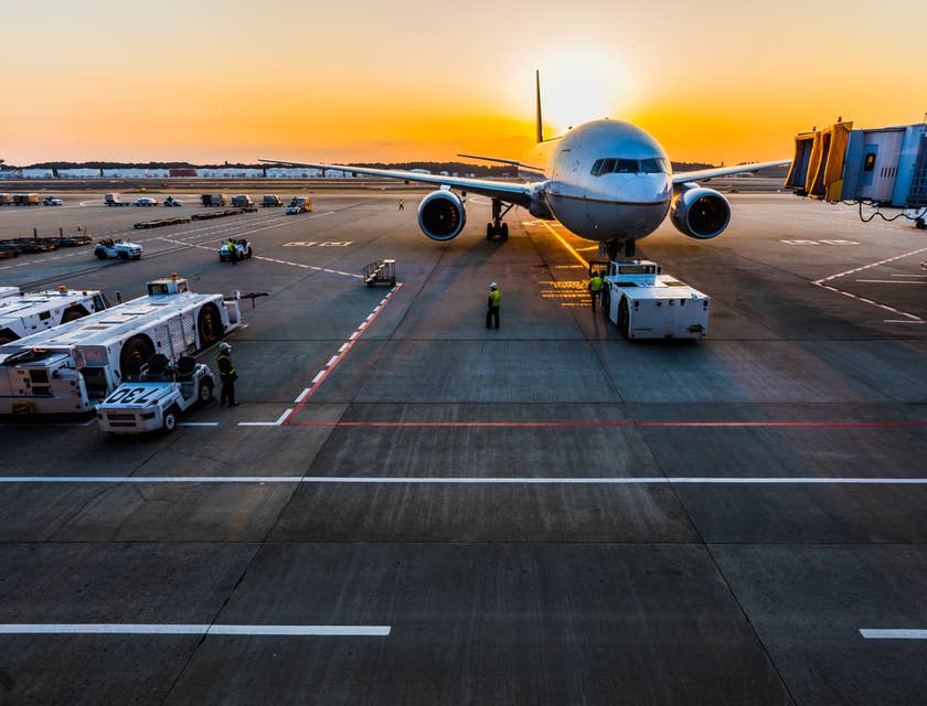 Ramp agents preparing to unload the passengers baggage and cargo after the plane lands