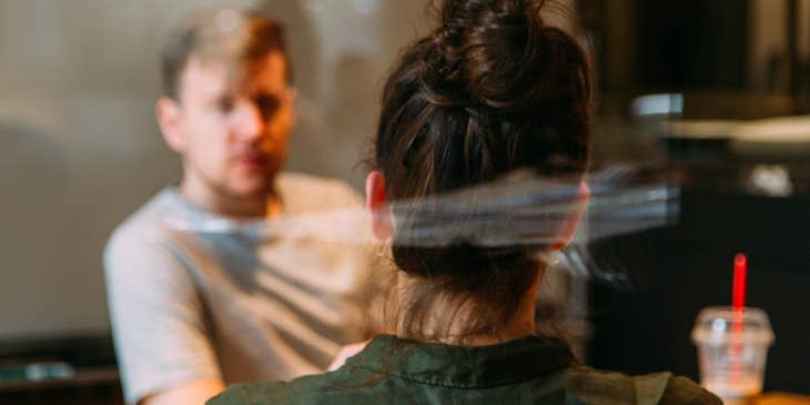 A female recruiter in an office setting interviewing an applicant.