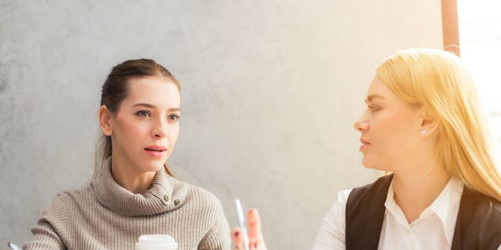 A recruitment consultant interviewing an applicant.