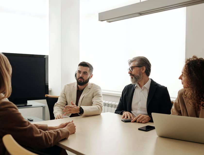 Recruitment Marketer along with the HR and Marketing lead in the middle of interviewing a candidate