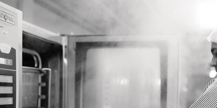 Refrigeration technician working on a commercial freezer