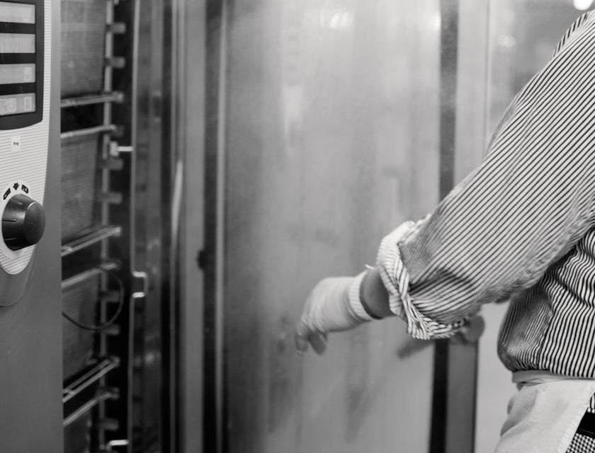 Refrigeration technician working on a commercial freezer