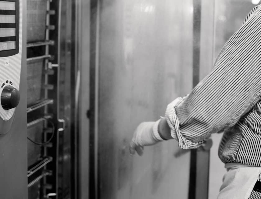 Refrigeration Technician working on a commercial freezer