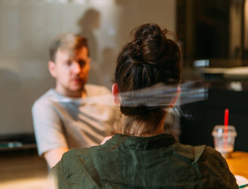 Retail merchandiser having a one-on-one interview to source information about the trends and product-related concerns