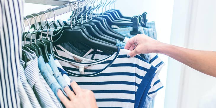 Retail store manager doing daily rotation checking for damaged items