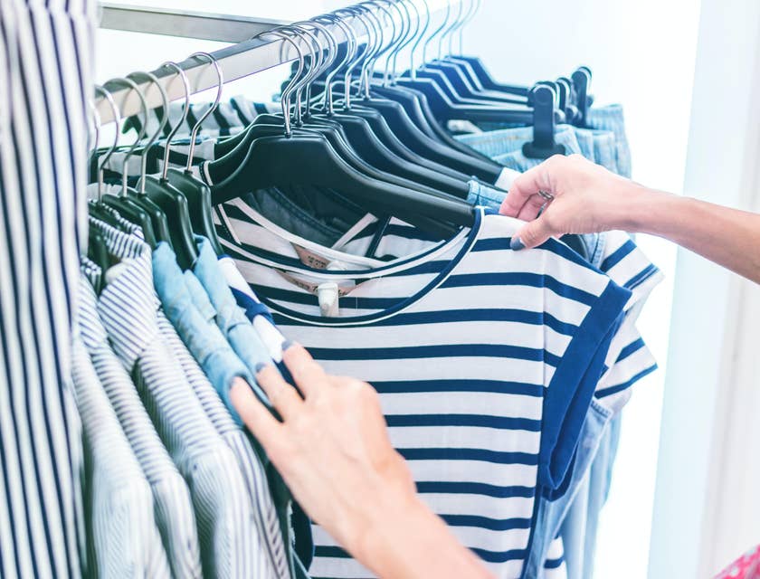 Retail store manager doing daily rotation checking for damaged items