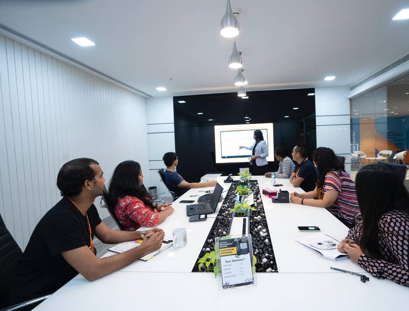 Sales and marketing manager briefing the sales and marketing team about the new sales plan and advertising campaigns