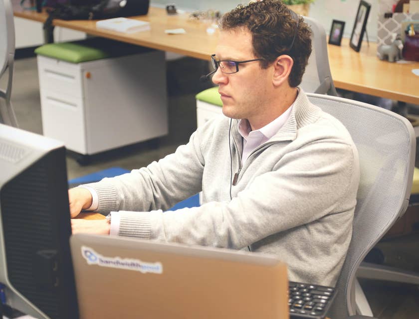 Security administrator updating the system to minimize cyber attack