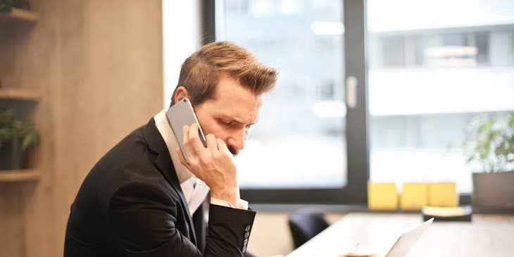 Senior consultant talking to a client addressing the issue that the client is having.