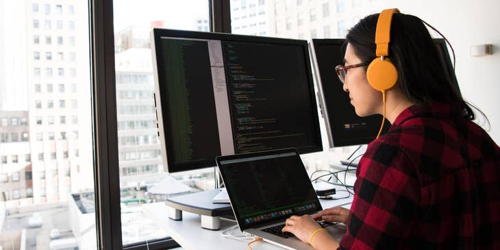 Senior developer giving the newly completed program a test run to see it there's any bugs.