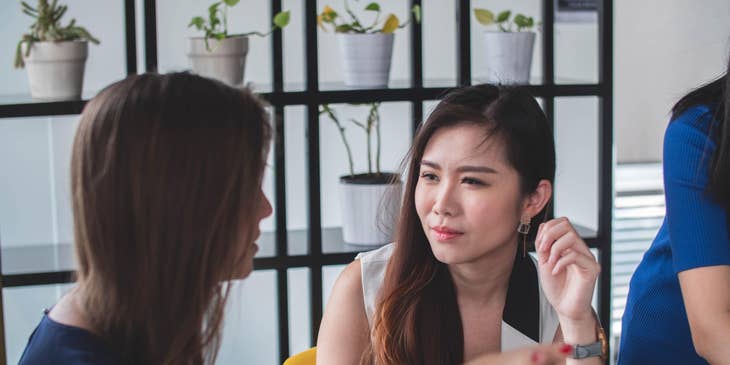 Senior sales executive guiding a newly hired Sales Representative on the best answers to clients' possible questions