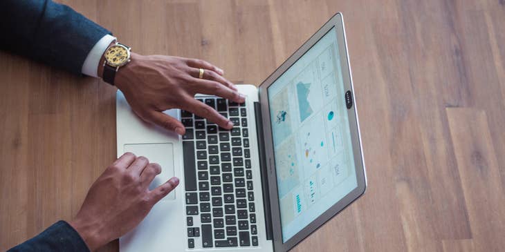SEO Manager reviewing the analytics of the campaign to be used as a reference to further improve the optimization of the campaign reach