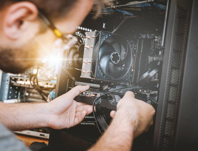 Service technician repairing a piece of equipment