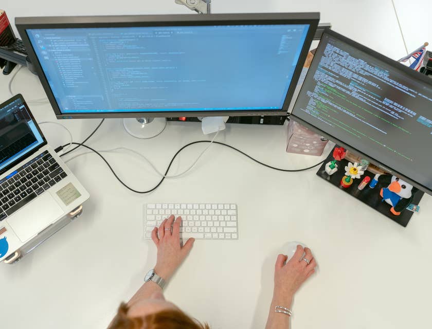 Software Developer modifying software to fix errors.