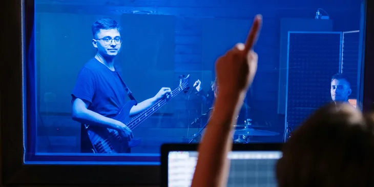 A sound engineer working in a studio.