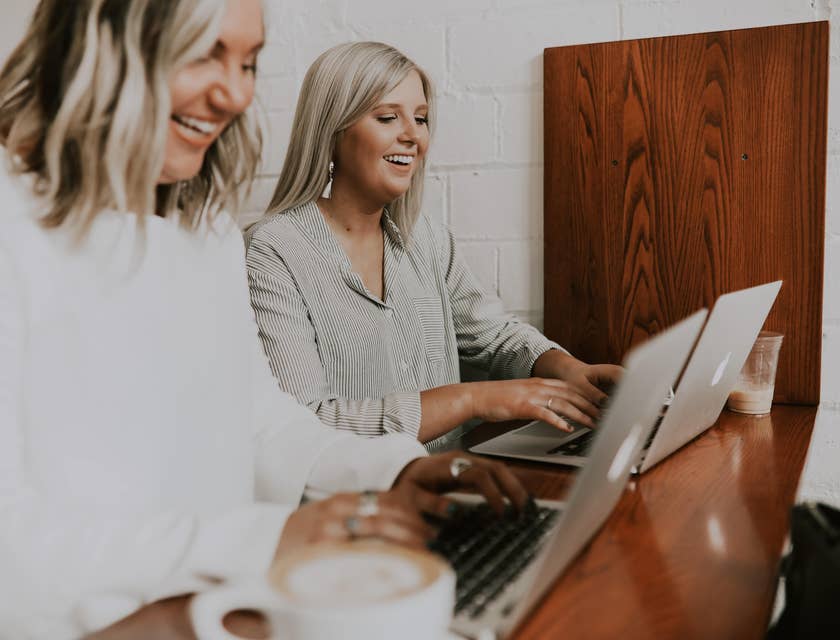 a couple of Staff Writers working on new articles about the current fashion