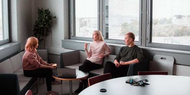 Two interviewers asking testing a candidates ability to handle stress.