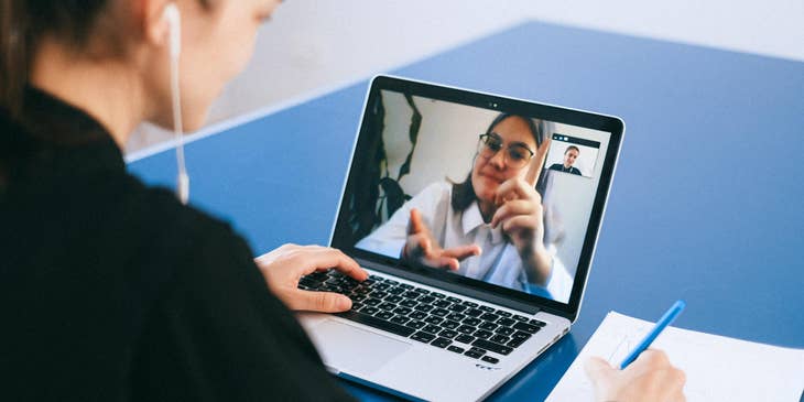 A female talent acquisition specialist conducting a video call interview with an applicant.