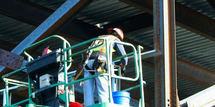 Technical officer performing structural maintenance