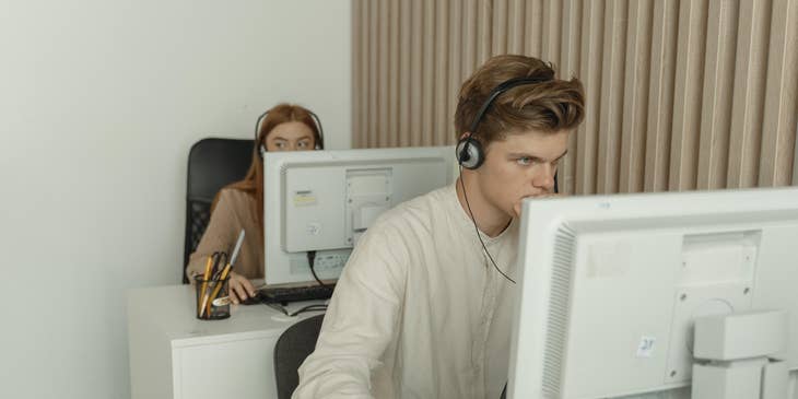 Technical support analyst assisting customers with technical issues.