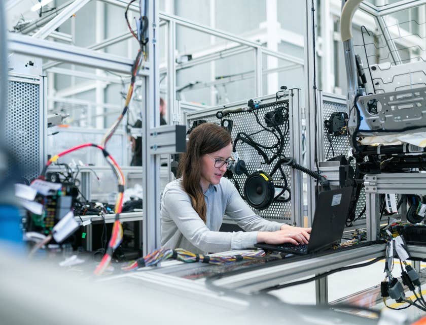 Test engineer running the test program for the newly manufactured product at a workshop