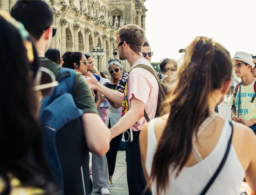 A Tour Guide discussing to a group of tourists.