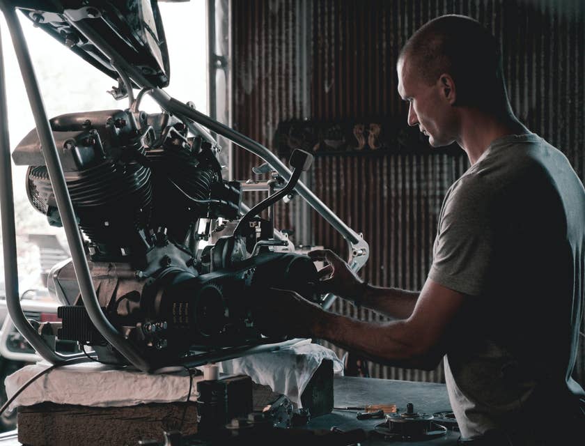 Trailer mechanic working on an engine