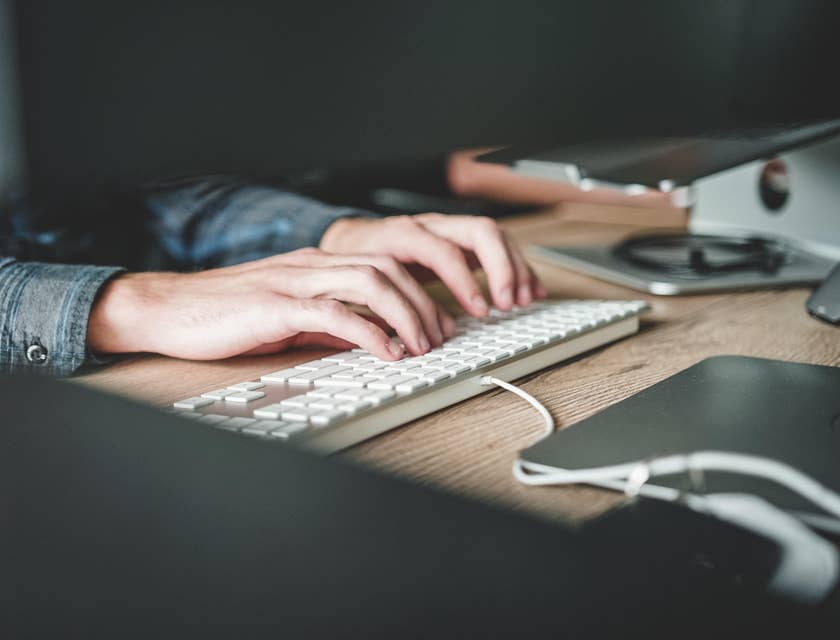 Transport administrator on a computer preparing schedules and tracking orders