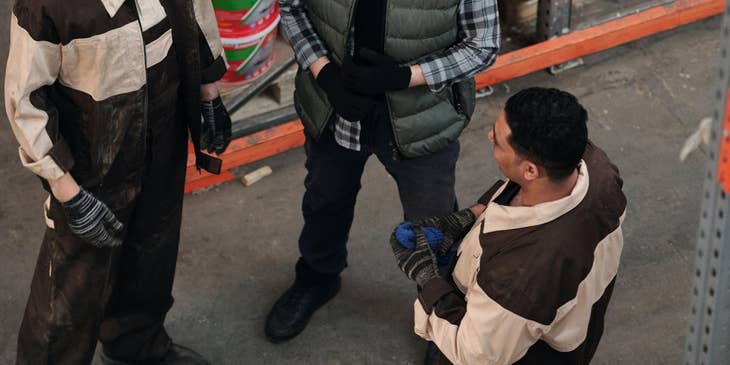 Transportation Manager giving instructions to the Warehouse Leads about the incoming shipment