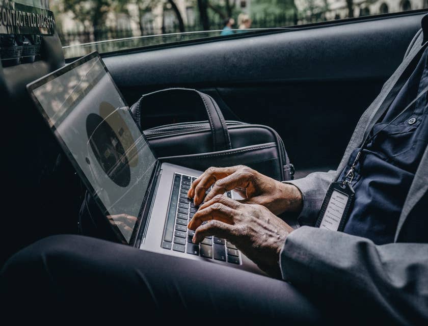 Travel Agent on his laptop.
