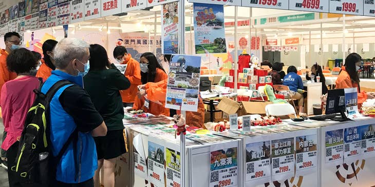 a booth of travel planners at an event