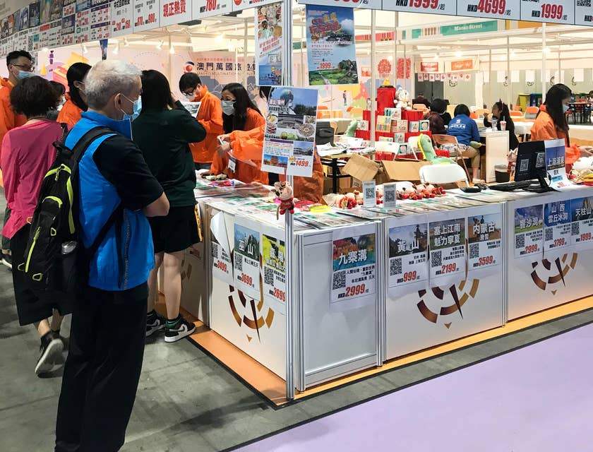 a booth of travel planners at an event