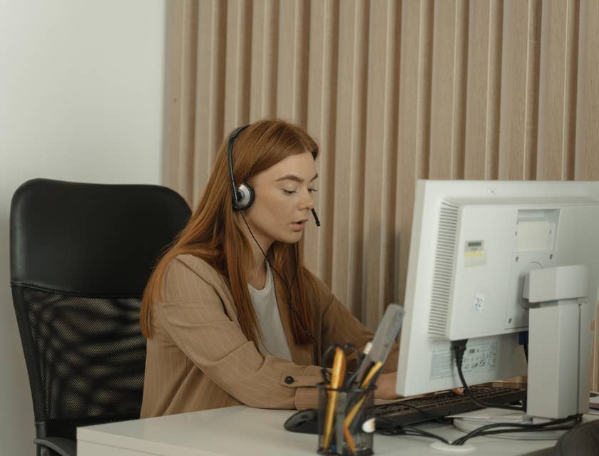 Truck Dispatcher talking to a customer about her freight details and delivery time