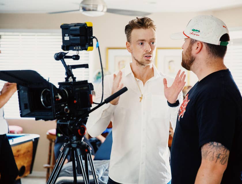 TV Producer discussing the plans with a videographer