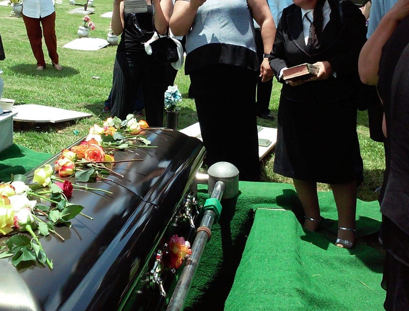 An undertaker handling funeral arrangements for the family of a deceased person.