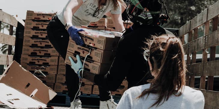 a volunteer manager looking over the center's incoming delivery and her team's workload