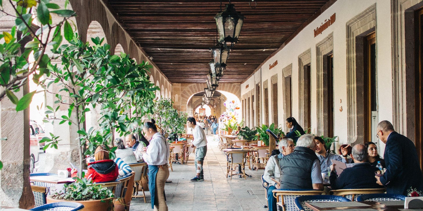 Wait Staff taking a customers' order.