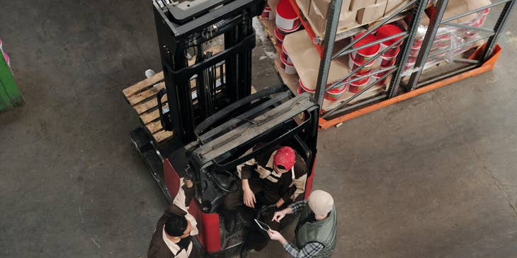 Warehouse supervisor giving the warehouse staffs their designated job for today