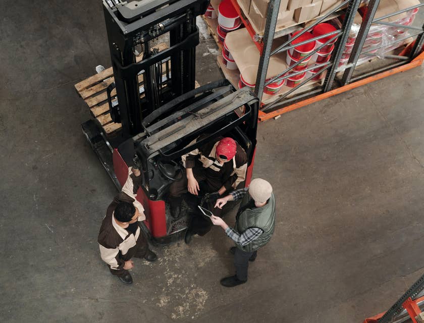 Warehouse supervisor giving the warehouse staffs their designated job for today