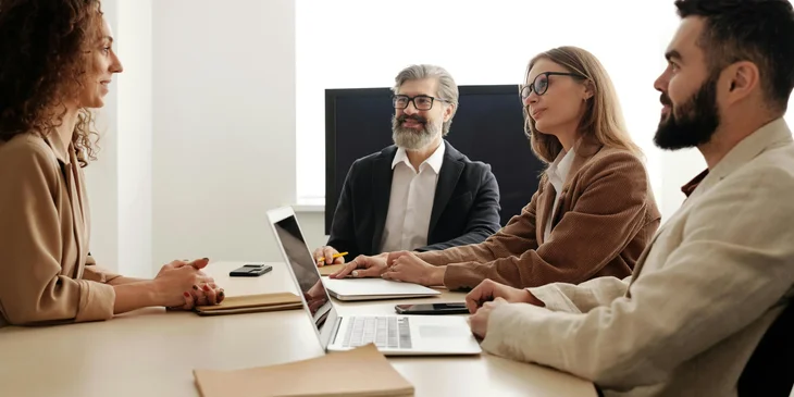People sitting in an office interview.