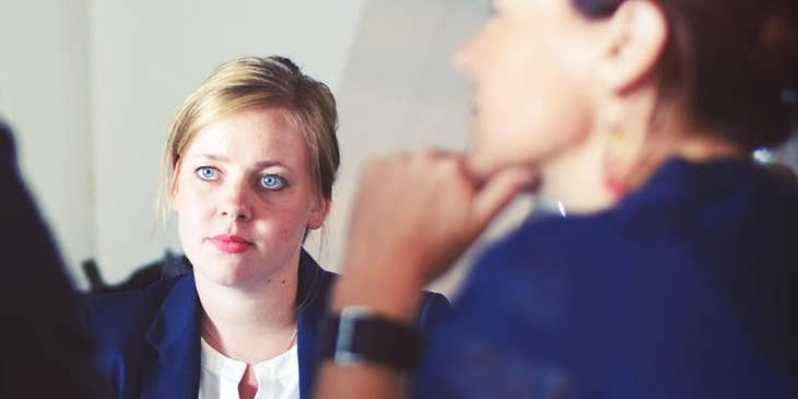 A businesswoman being interviewed.
